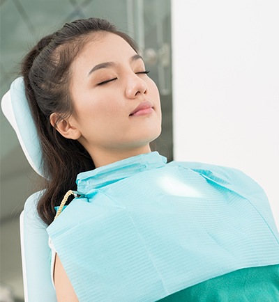 woman in dental chair sedated