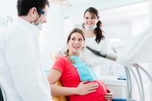 pregnant patient being treated at the dentist’s office